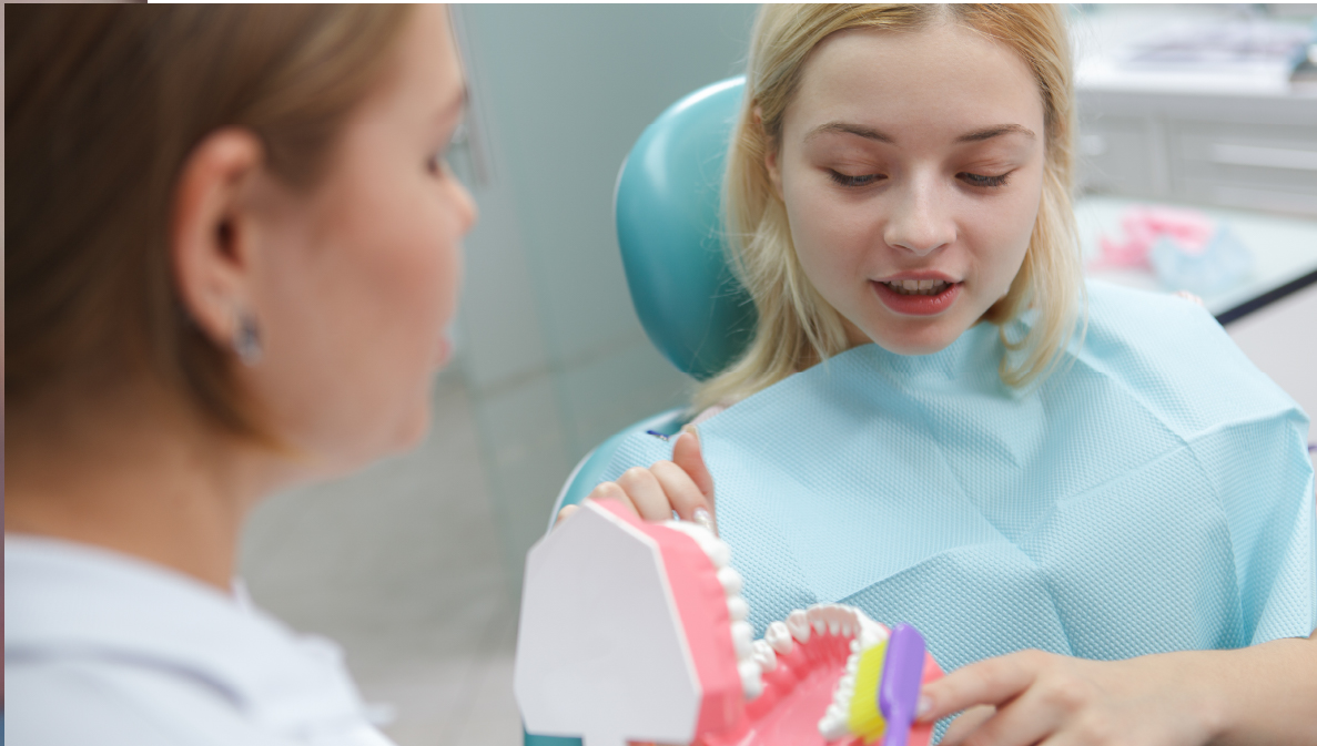patient learning about gum disease from dentist