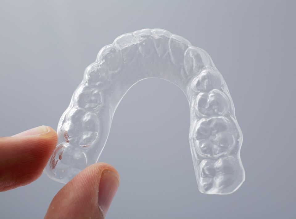 Pros and Cons of Clear Retainers After Houston Braces Treatment