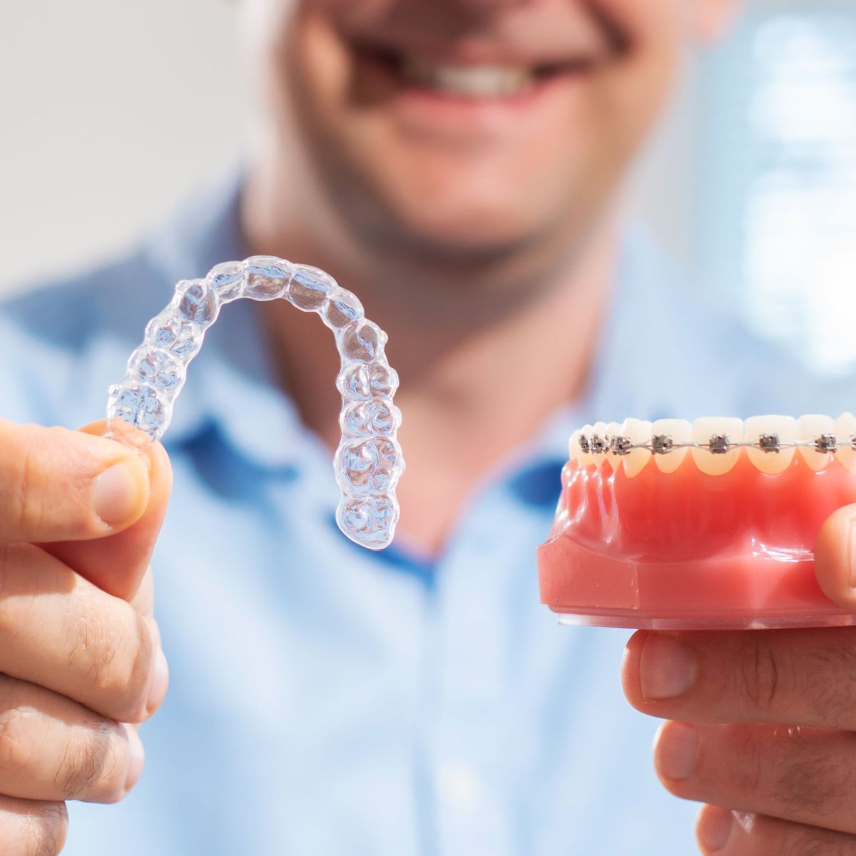 A comparison of Invisalign and metal braces
